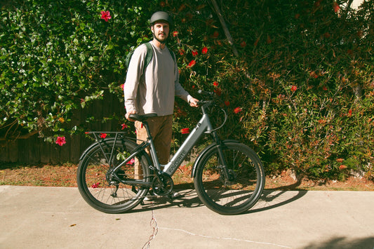 FavoriteBikes rider in everyday commuting clothes, showing practical comfort and visibility for e-bike commutes.