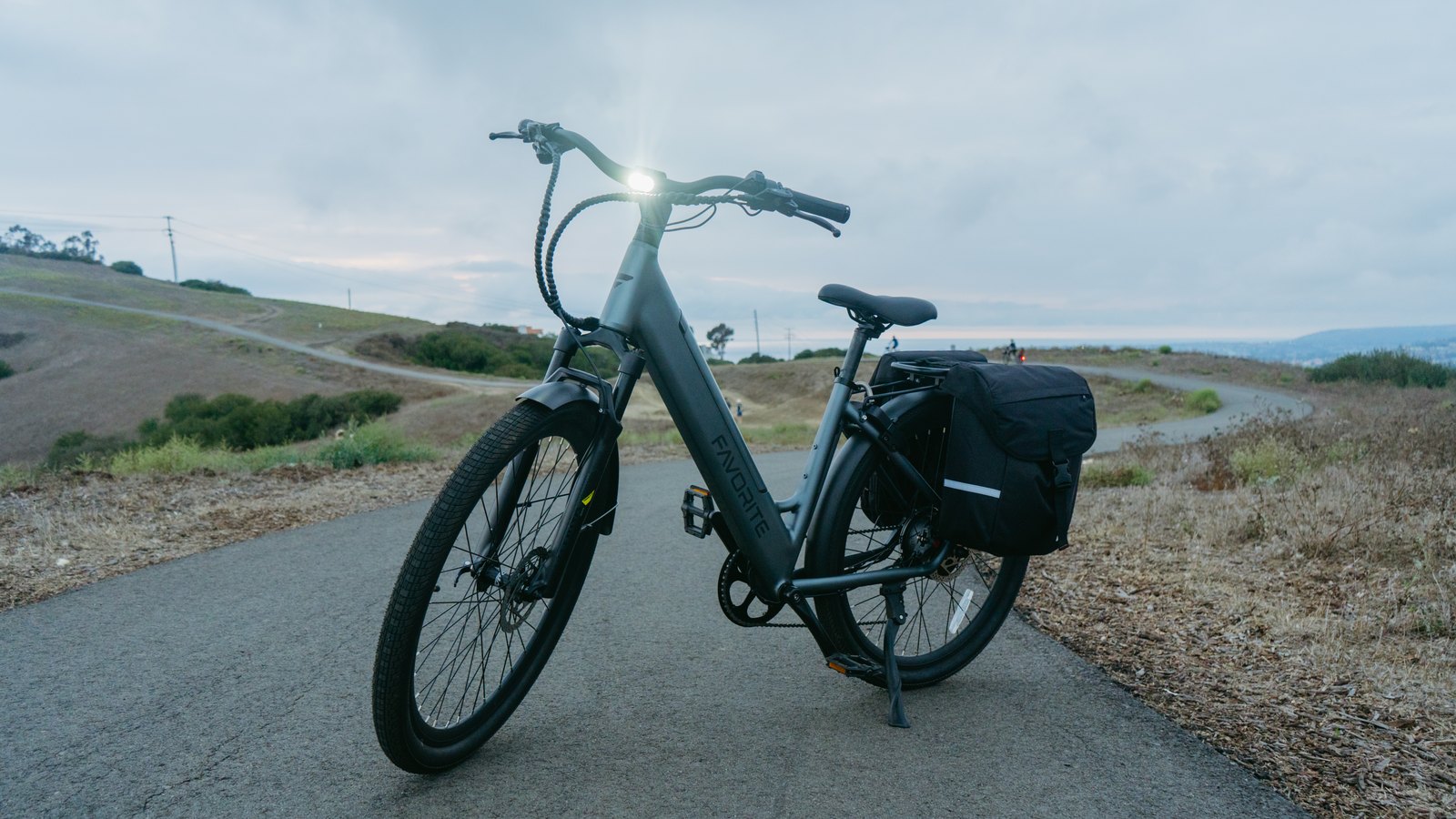 FavoriteBikes e-bike with rear cargo bag on an open path, illustrating grocery run setup.