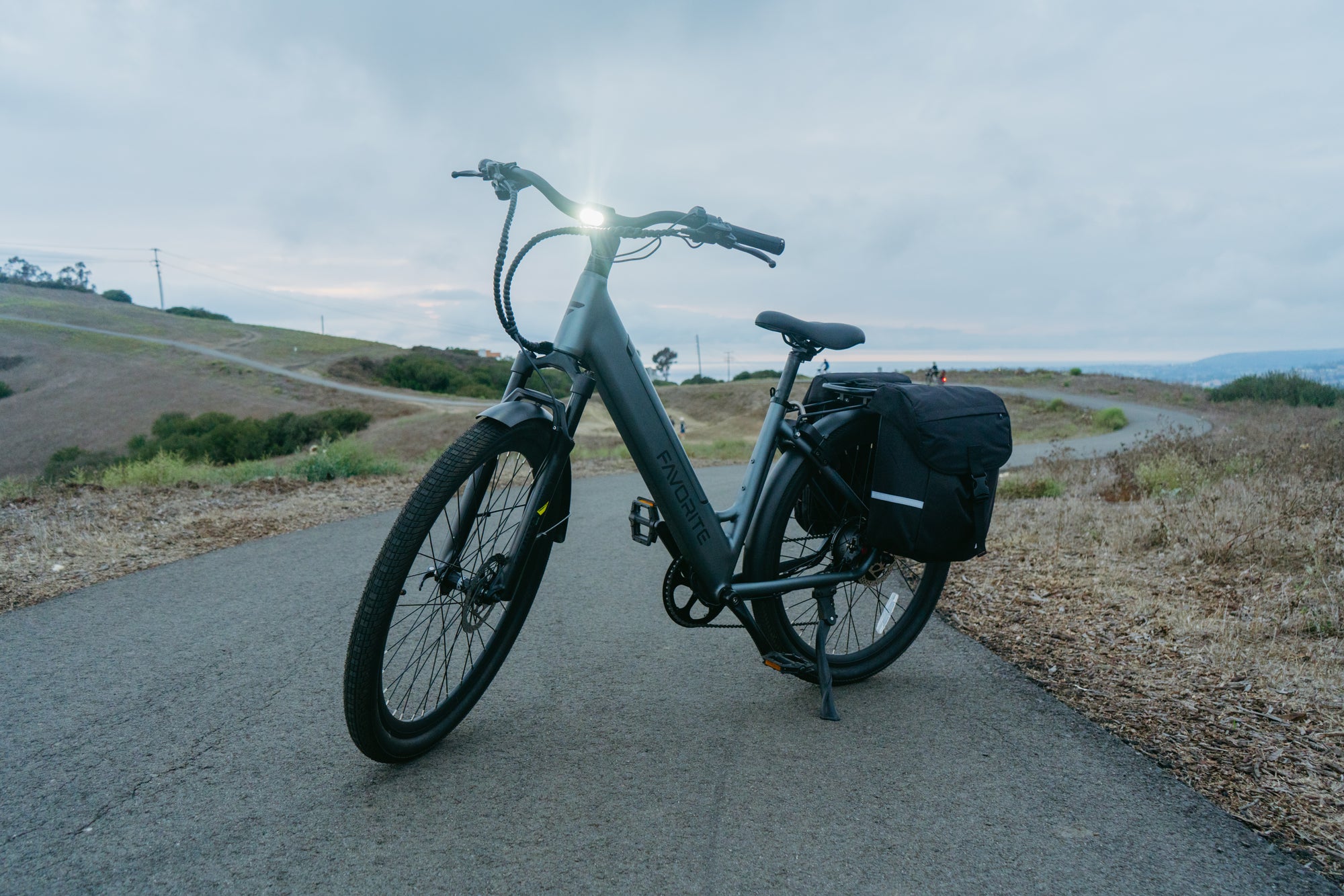FavoriteBikes e-bike parked on its kickstand on a paved path, illustrating kickstand and parking stability tips.