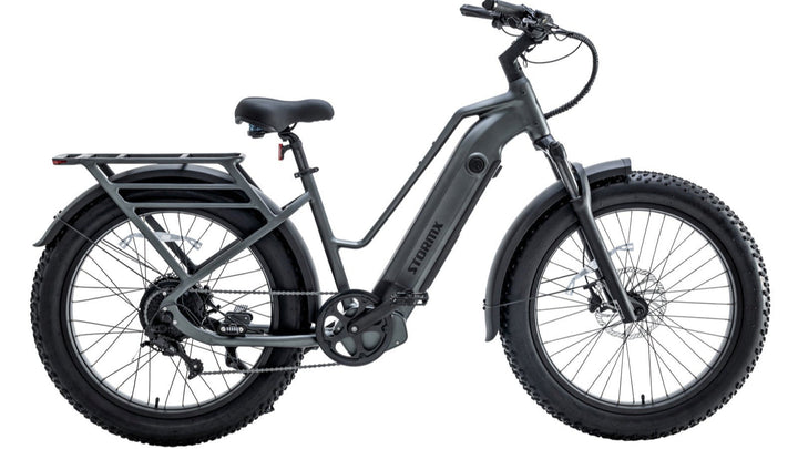 Side profile of certified refurbished FavoriteBikes StormX fat tire e-bike with step-through frame, integrated battery, and fat tires.