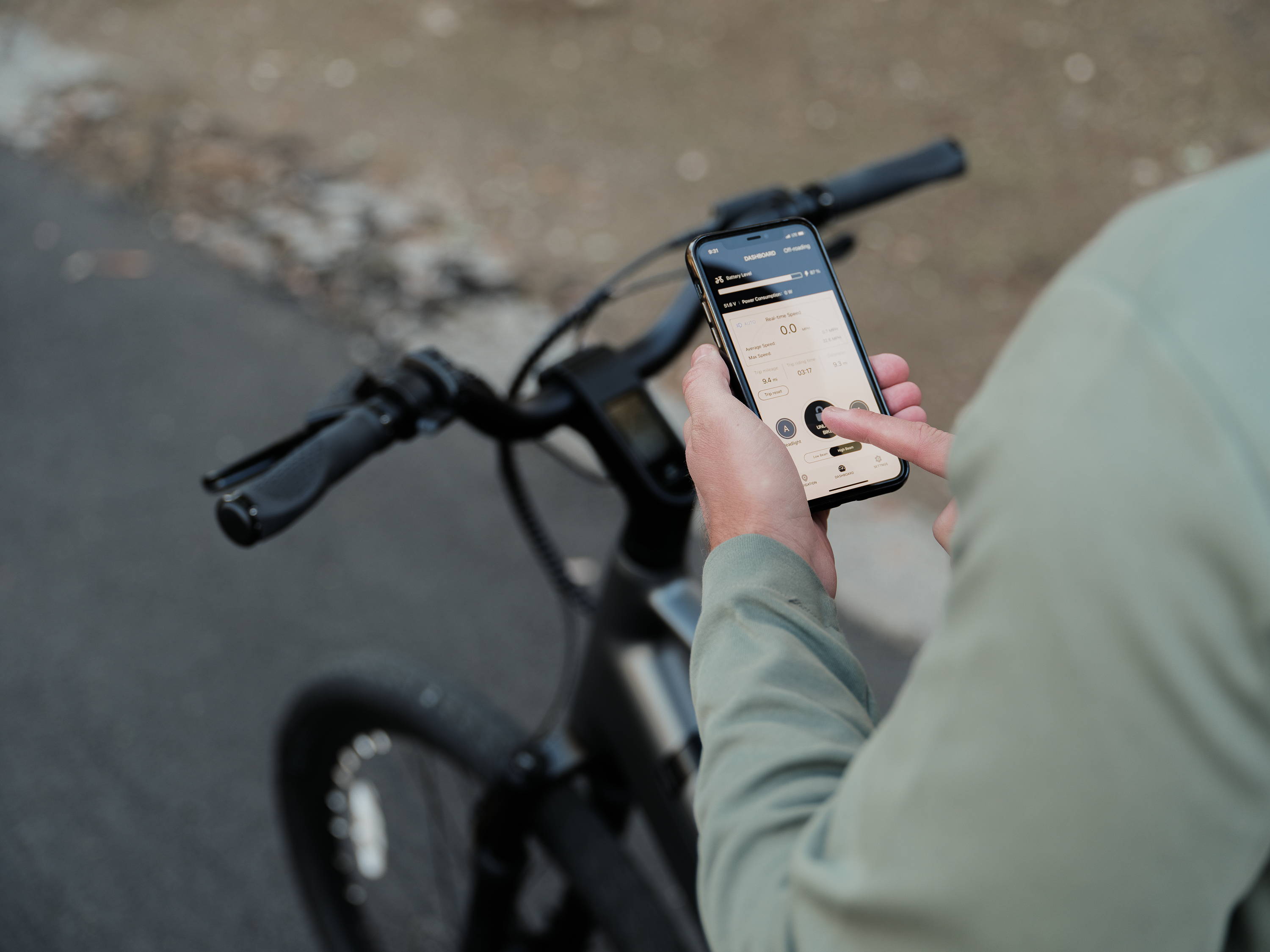 FavoriteBikes rider using the app near the bike for app access and setup