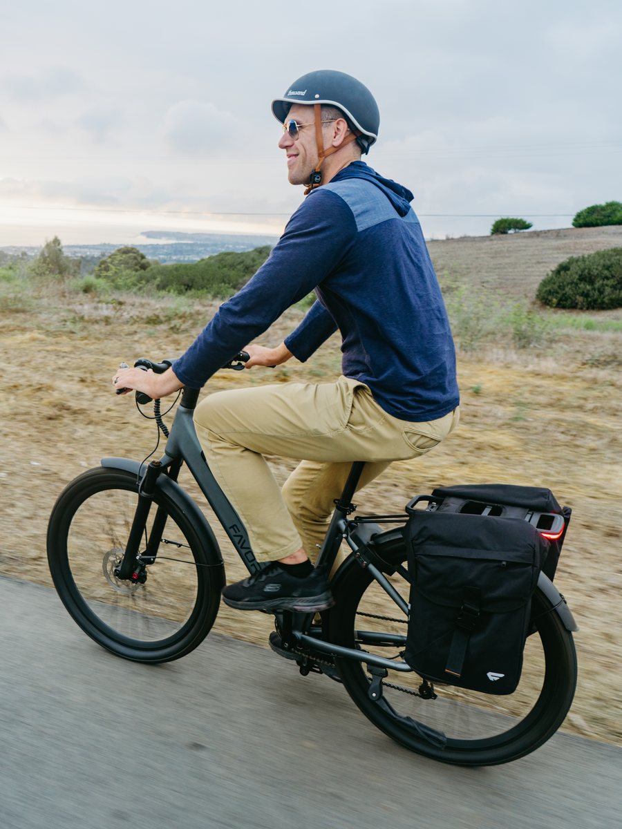 FavoriteBikes Hybrid CSC rider creating content on an open road